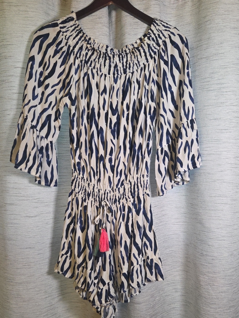 Off-Shoulder Animal Print Romper with Tassel